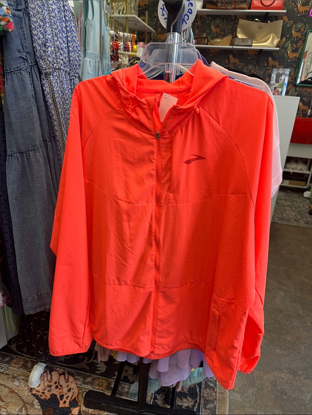 Brooks Women's Neon Coral Hooded Windbreaker Jacket